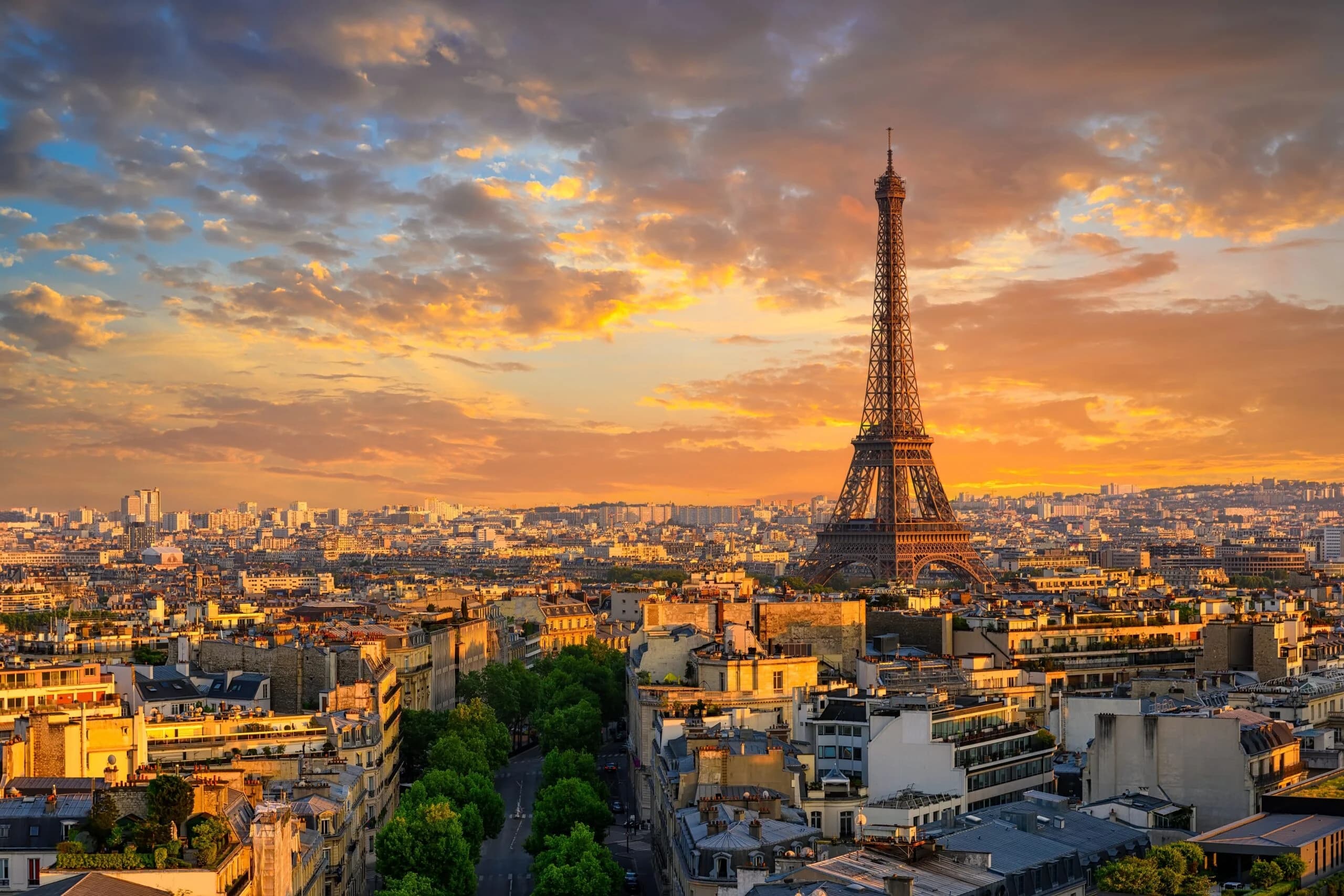 Eiffel Tower and Paris rooftops at sunset